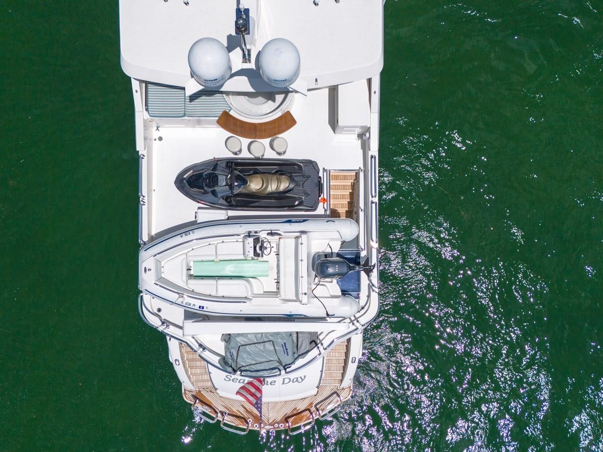 a car with a door open aboard 101' HARGRAVE Yacht for Sale