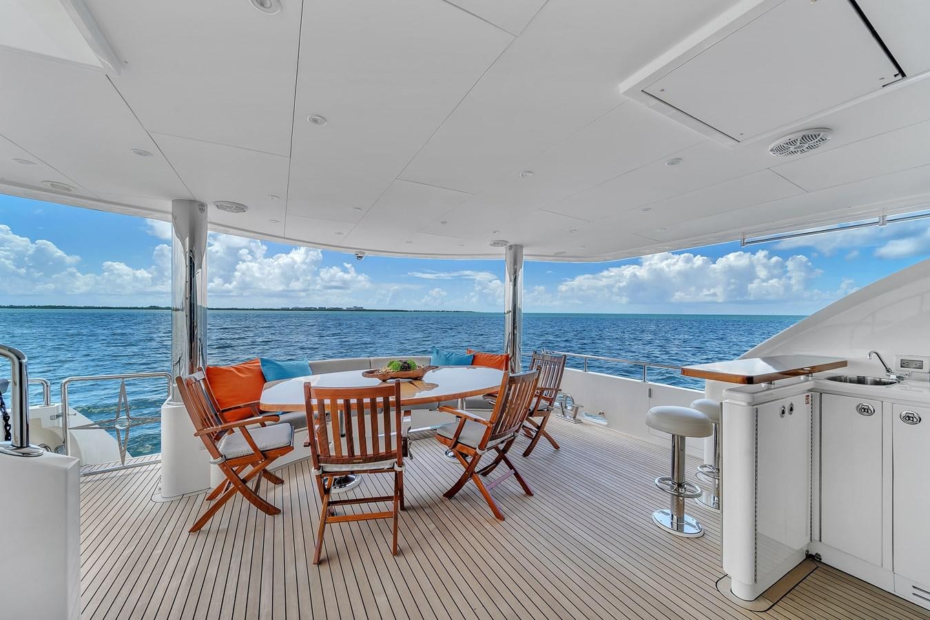 a table and chairs on a boat aboard 101' HARGRAVE Yacht for Sale