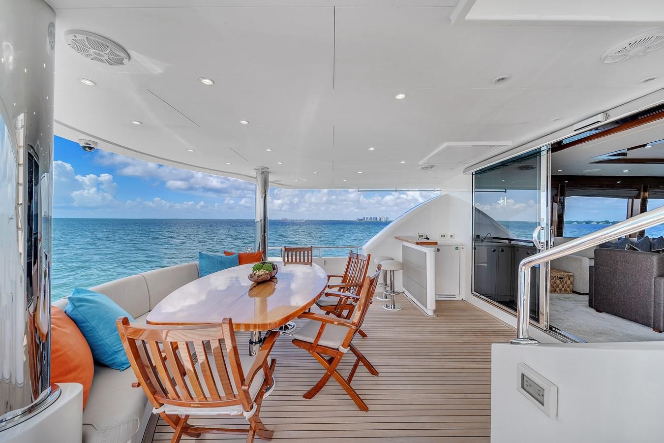 a room with a table and chairs aboard 101' HARGRAVE Yacht for Sale
