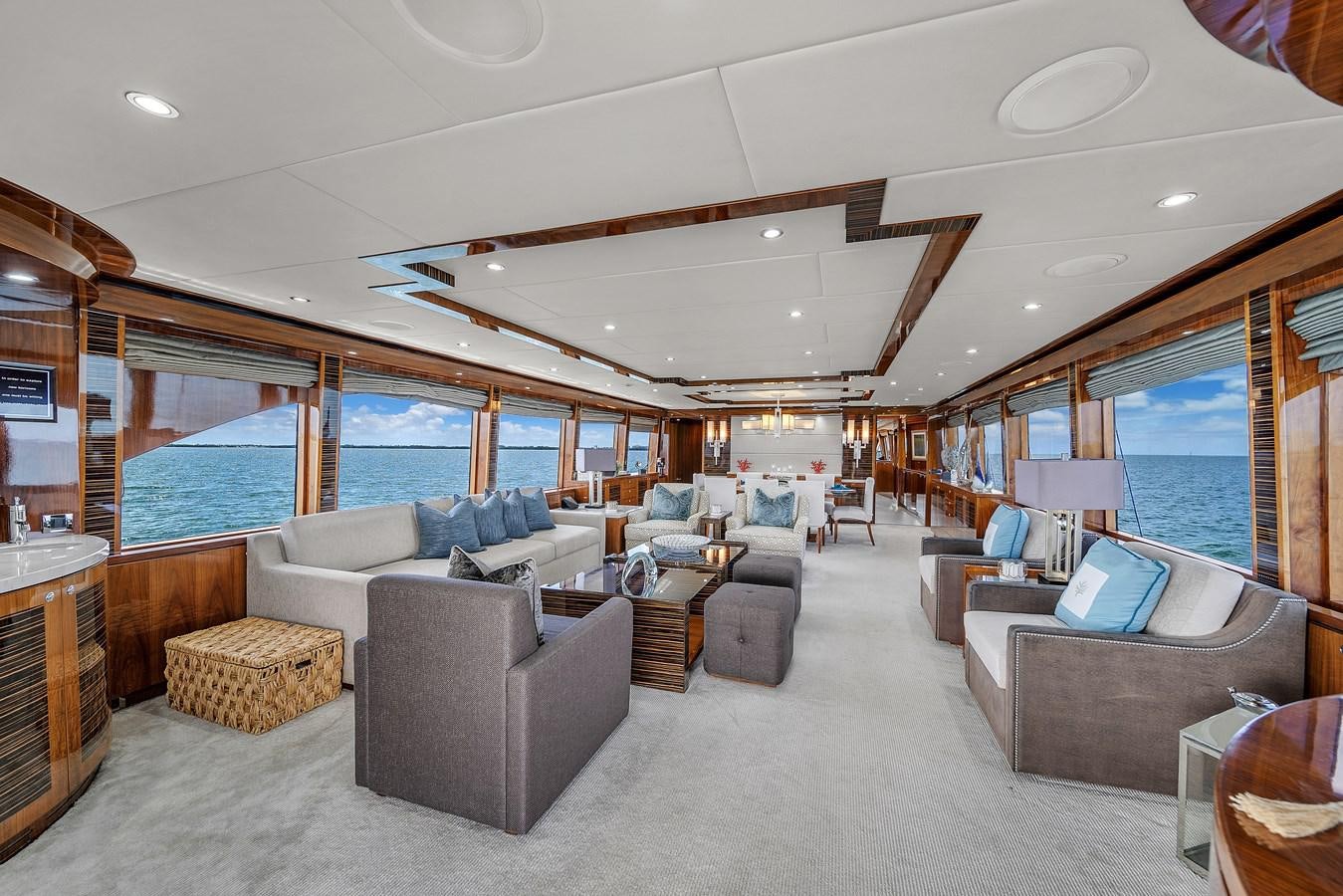 a living room with a large window aboard 101' HARGRAVE Yacht for Sale