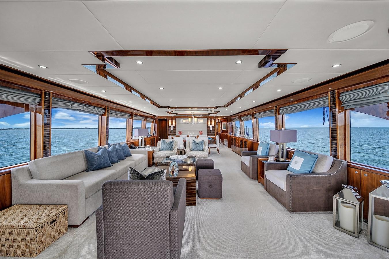 a living room with a large window aboard 101' HARGRAVE Yacht for Sale
