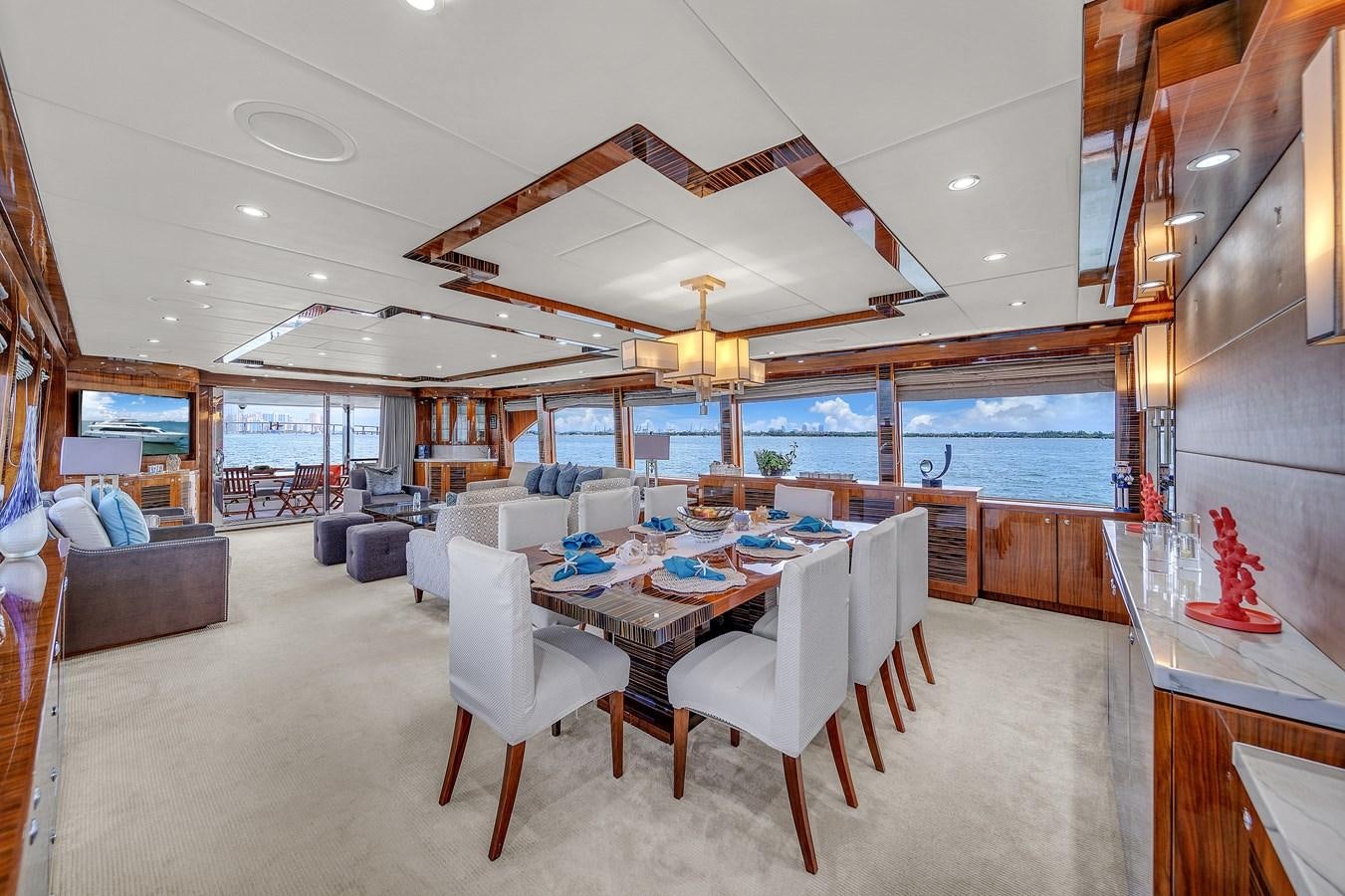 a large room with a table and chairs aboard 101' HARGRAVE Yacht for Sale
