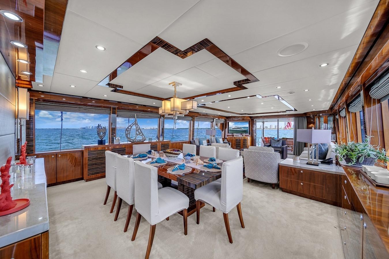 a large kitchen with a dining table aboard 101' HARGRAVE Yacht for Sale