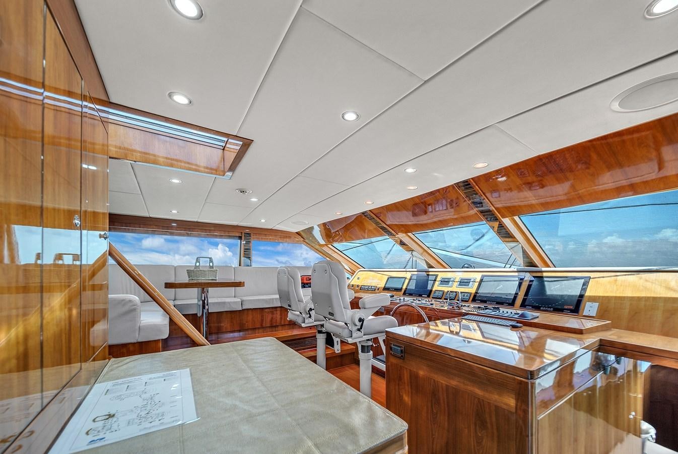 a room with a desk and chairs aboard 101' HARGRAVE Yacht for Sale