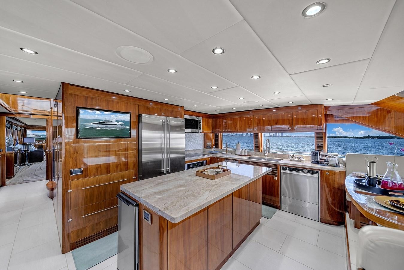 a kitchen with a large island aboard 101' HARGRAVE Yacht for Sale