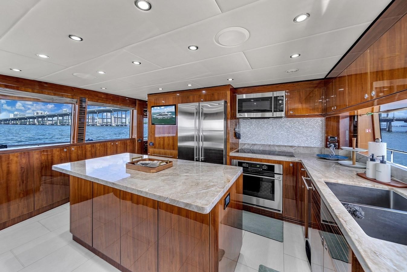 a kitchen with a large island aboard 101' HARGRAVE Yacht for Sale