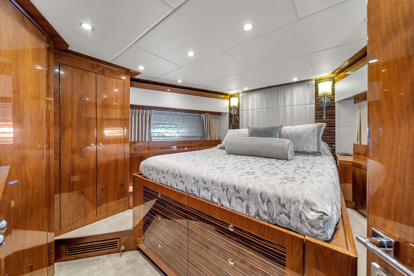 a bed in a room aboard 101' HARGRAVE Yacht for Sale