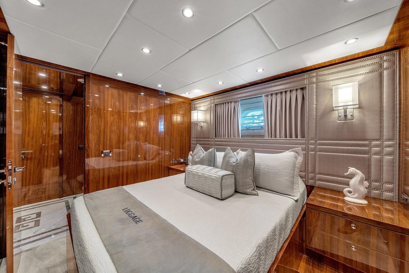 a bed in a room aboard 101' HARGRAVE Yacht for Sale