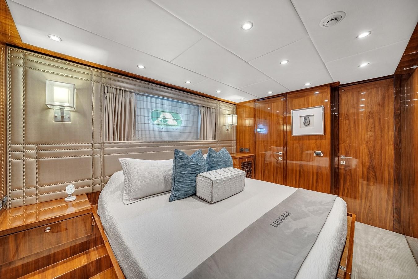 a bed in a room aboard 101' HARGRAVE Yacht for Sale