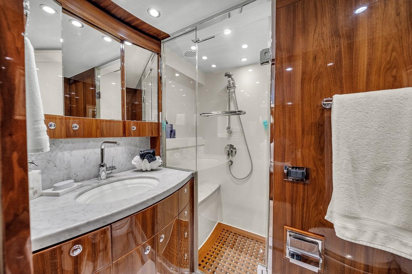 a bathroom with a large mirror aboard 101' HARGRAVE Yacht for Sale