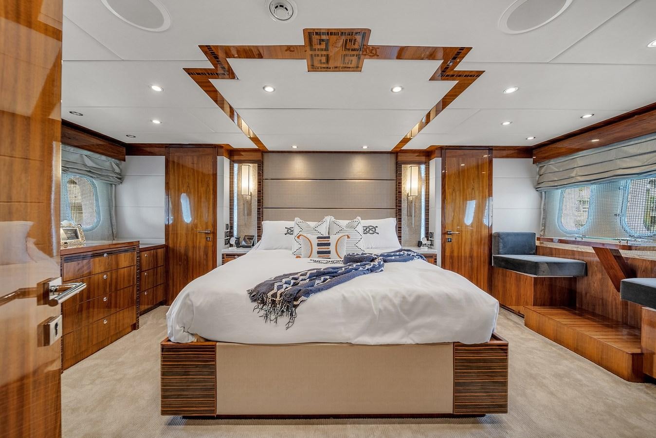 a large bedroom with a large bed aboard 101' HARGRAVE Yacht for Sale
