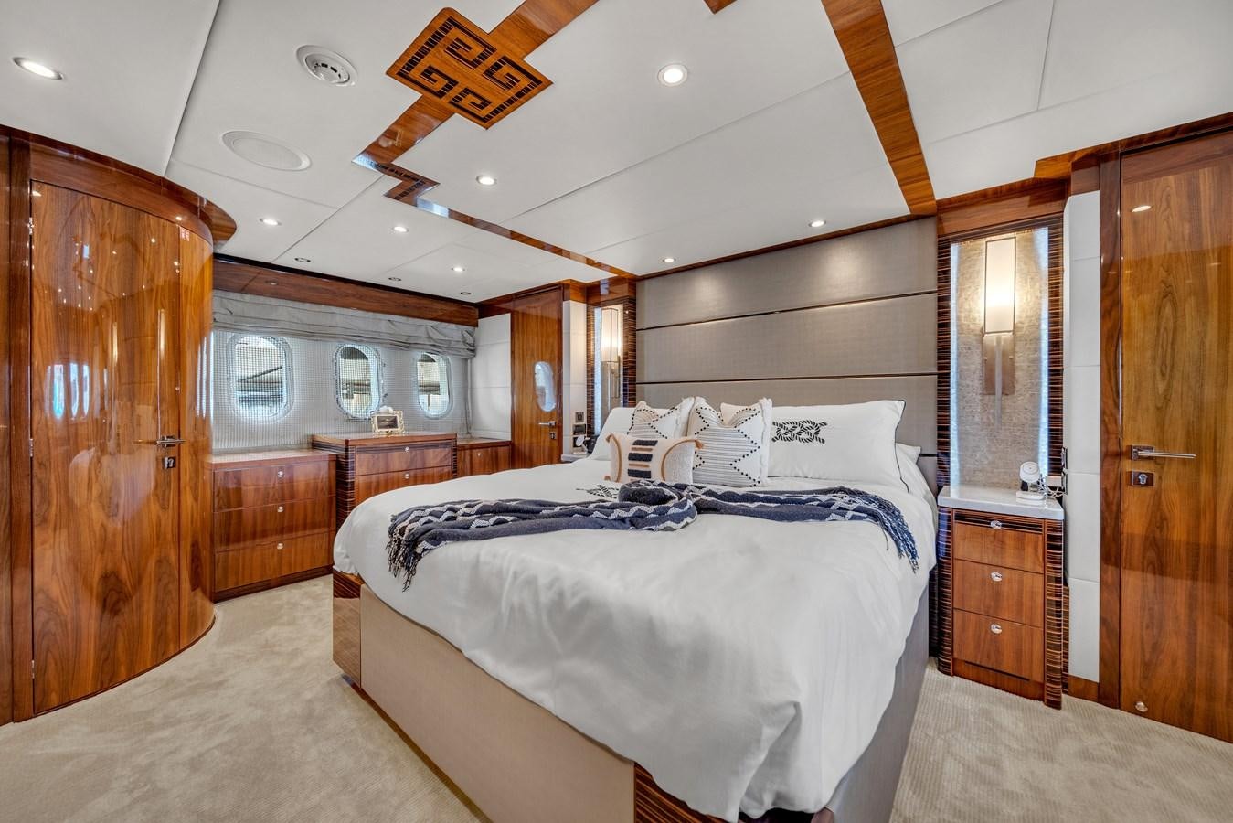 a large bedroom with a bed aboard 101' HARGRAVE Yacht for Sale