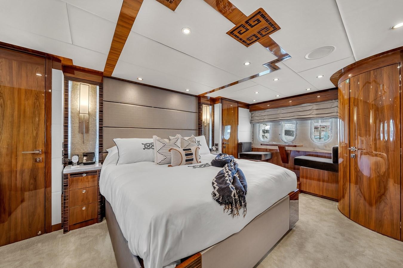 a large bedroom with a bed aboard 101' HARGRAVE Yacht for Sale