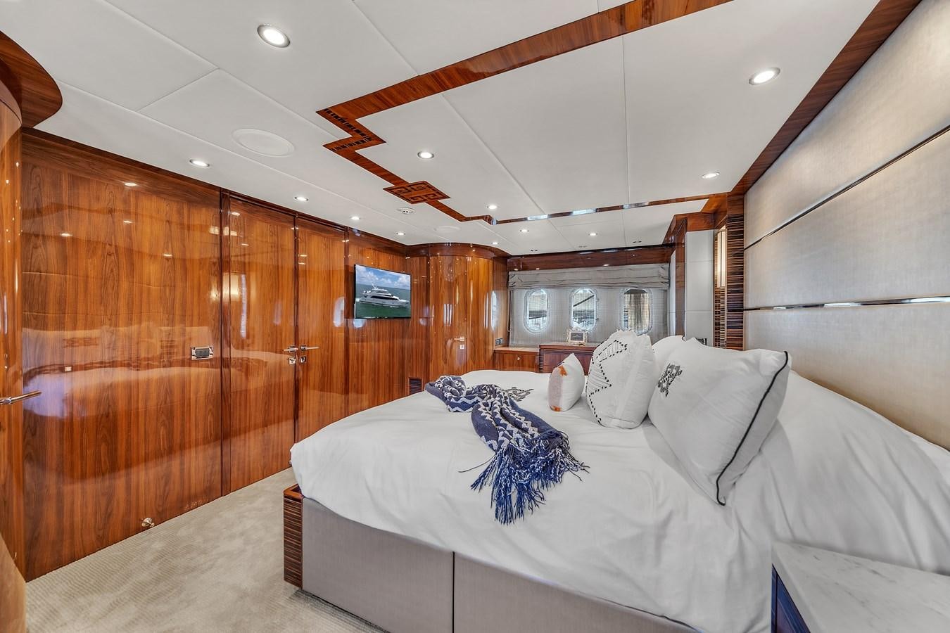 a bed in a room aboard 101' HARGRAVE Yacht for Sale