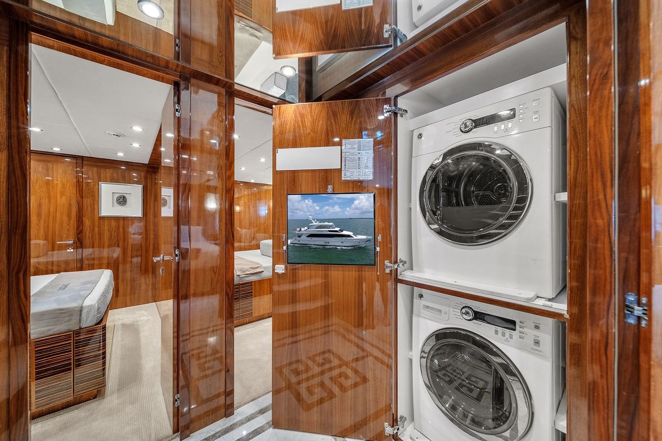 a room with a washer and dryer aboard 101' HARGRAVE Yacht for Sale