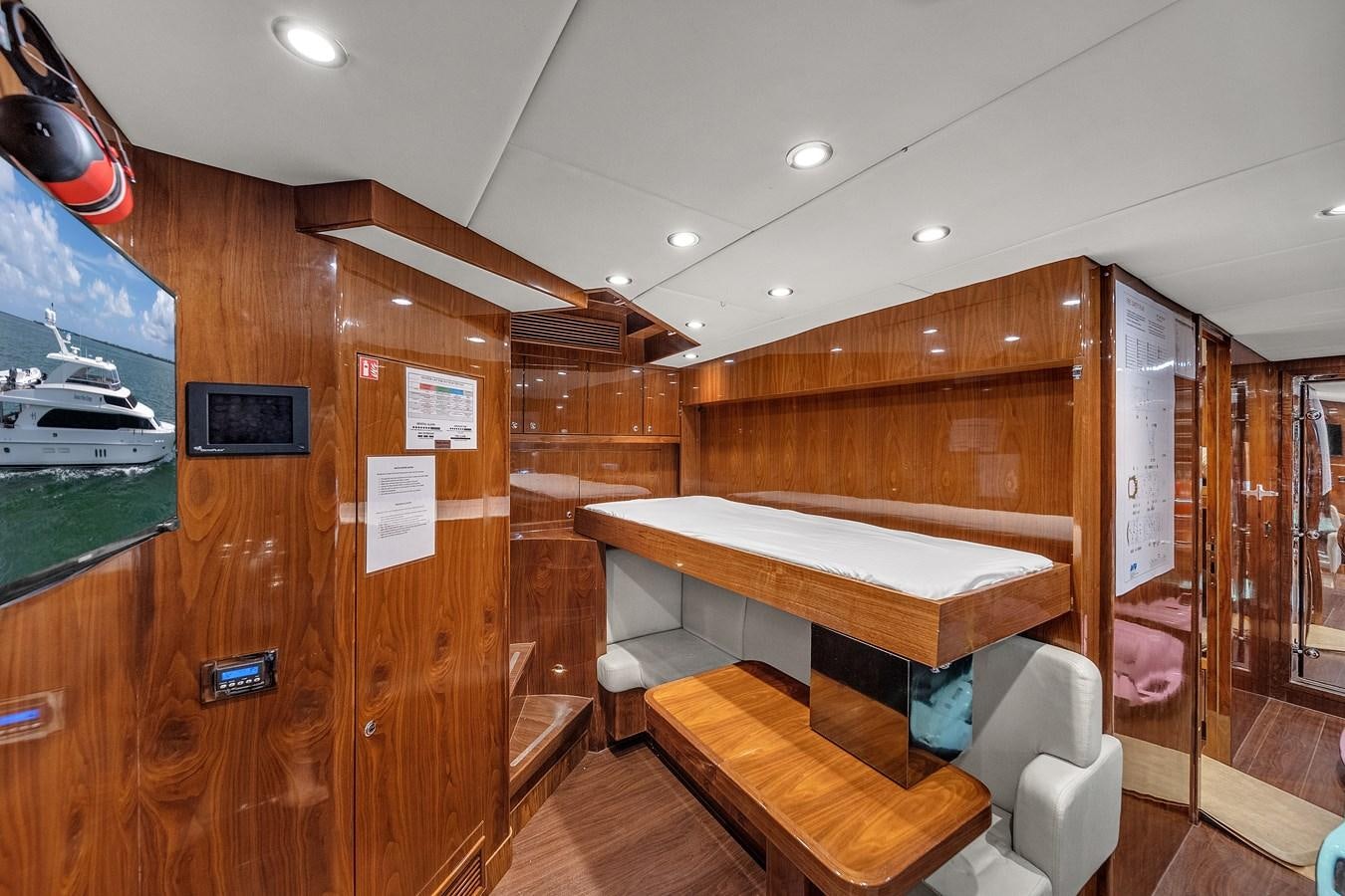 a room with a bed and a desk aboard 101' HARGRAVE Yacht for Sale