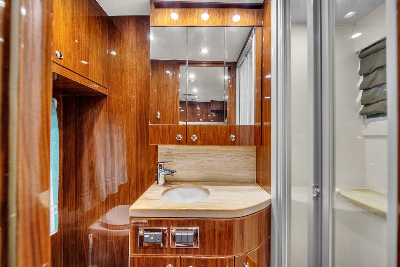 a bathroom with a sink and a mirror aboard 101' HARGRAVE Yacht for Sale