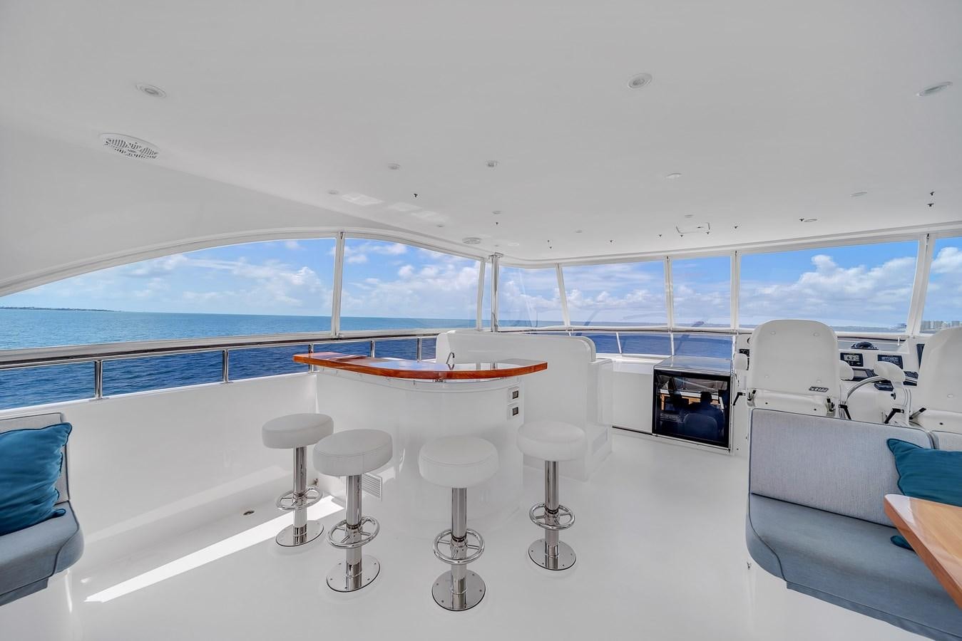 a room with a table and chairs aboard 101' HARGRAVE Yacht for Sale
