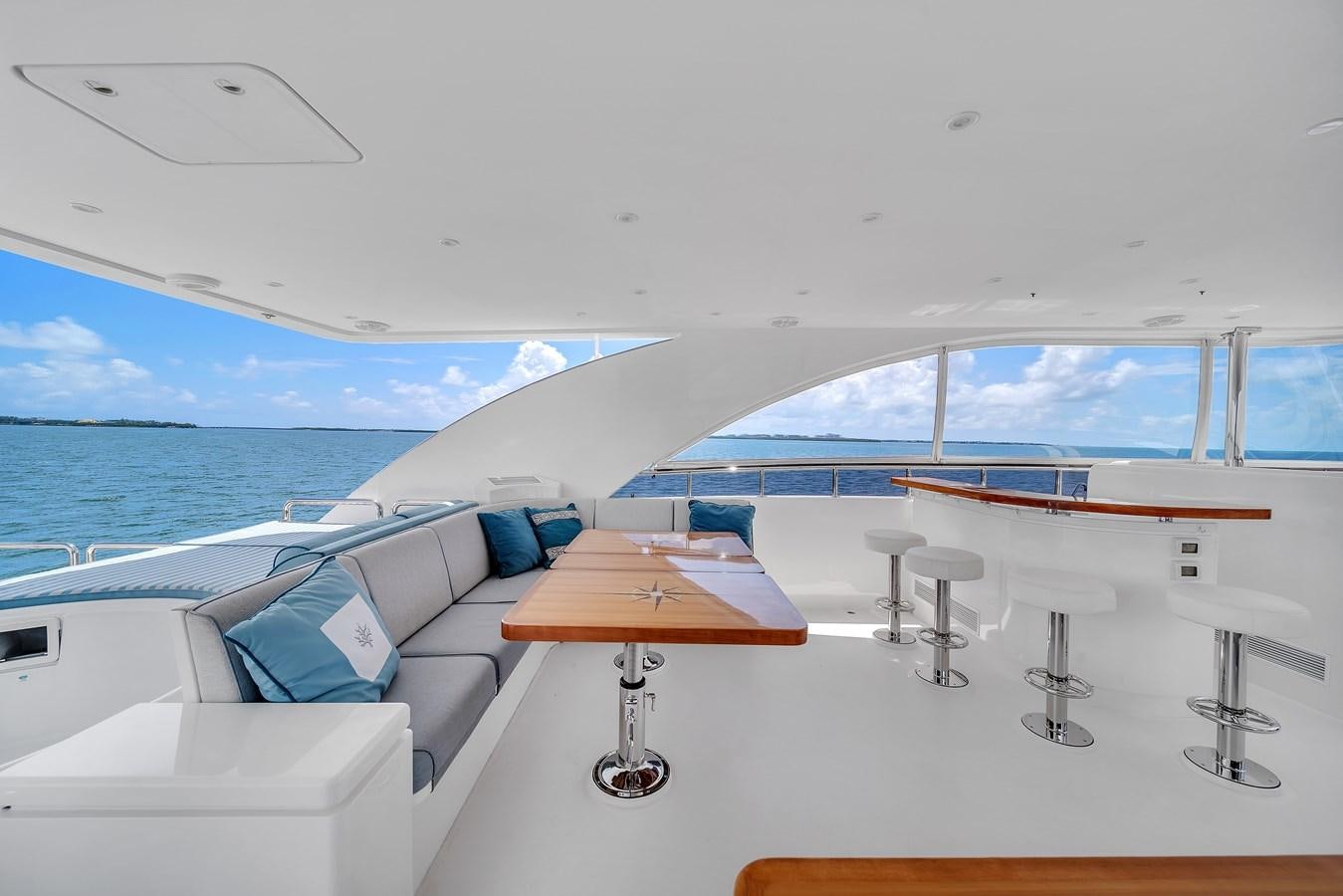 a room with a table and chairs aboard 101' HARGRAVE Yacht for Sale