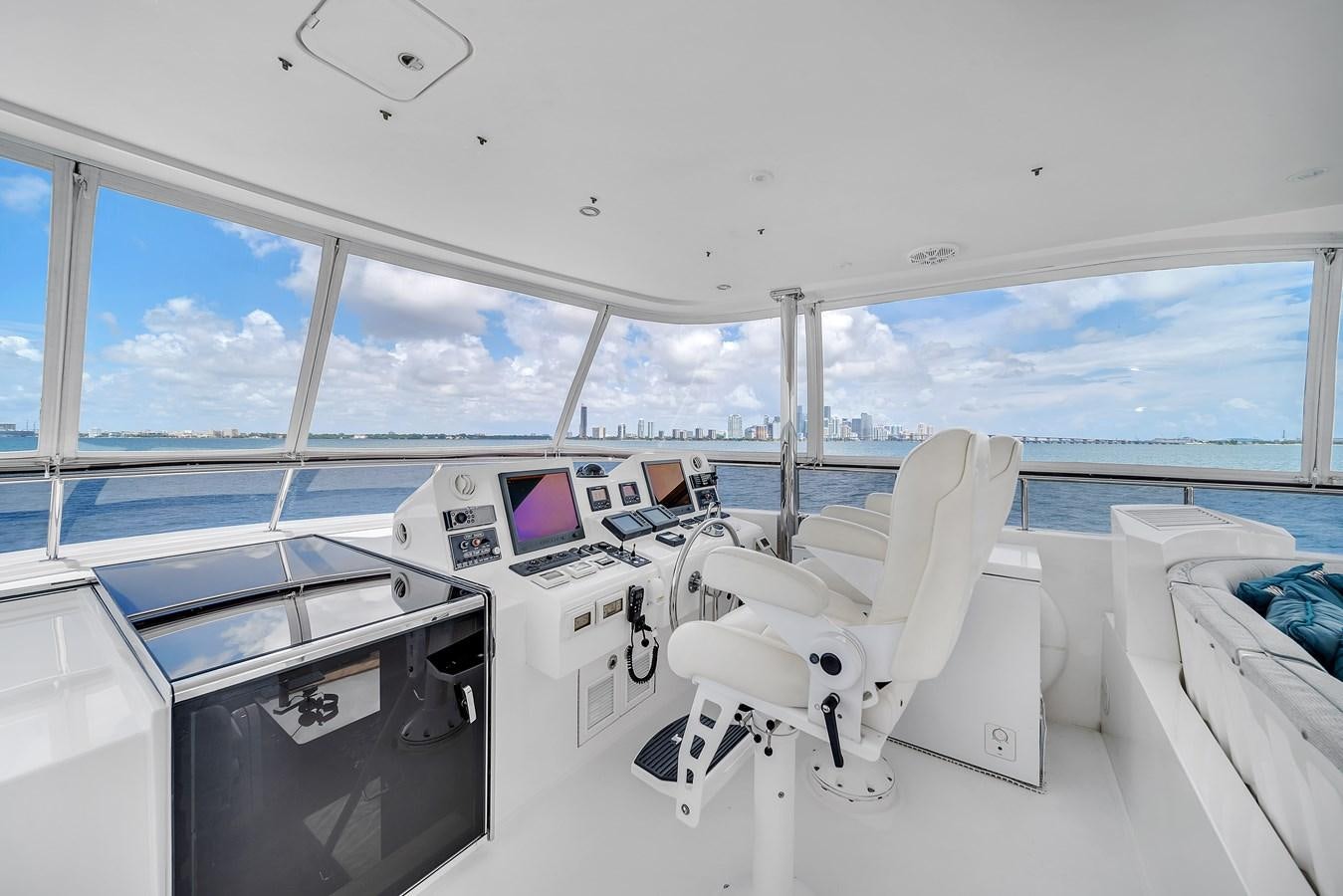 a white chair on a boat aboard 101' HARGRAVE Yacht for Sale