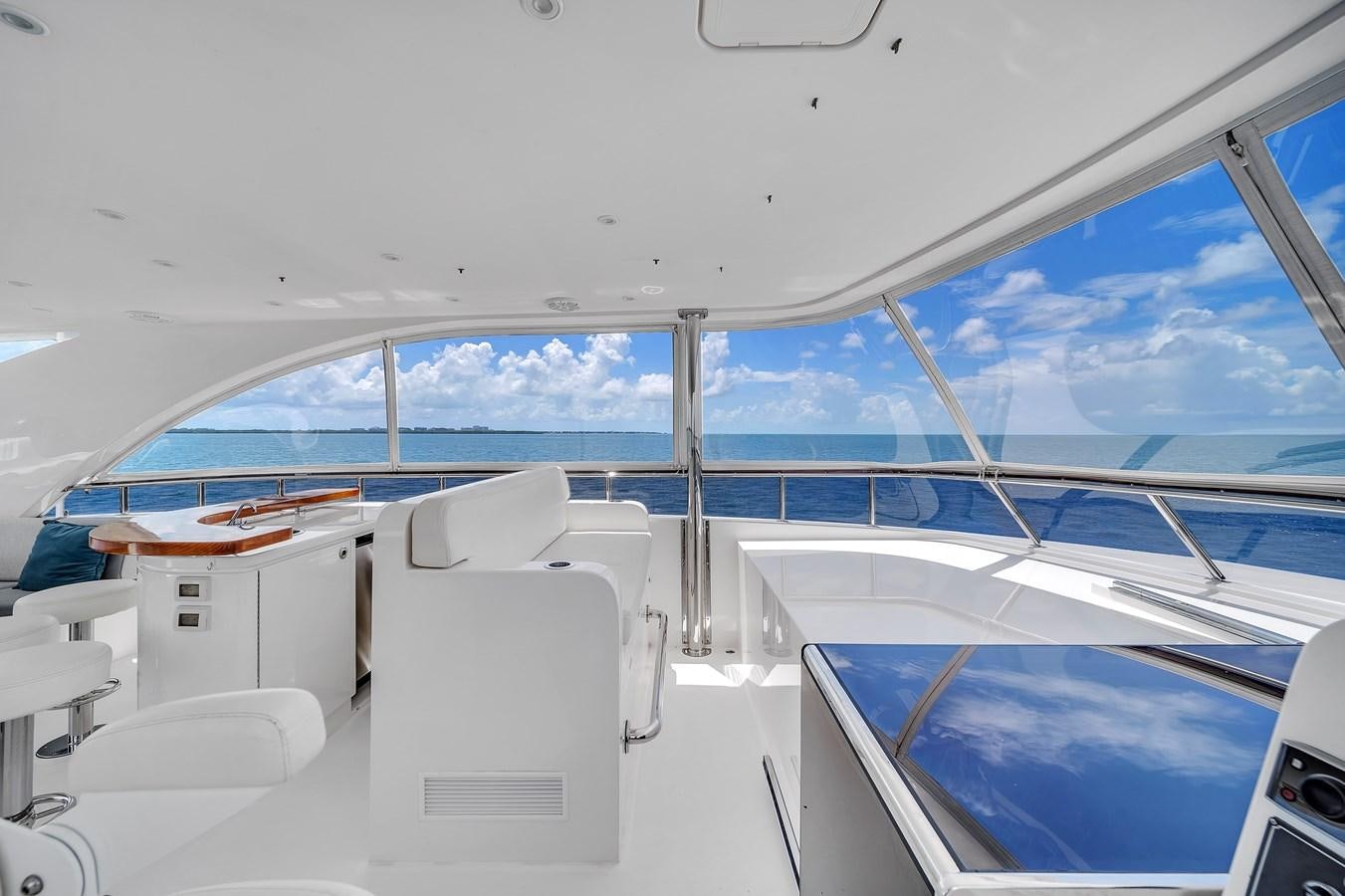 a boat with white chairs aboard 101' HARGRAVE Yacht for Sale