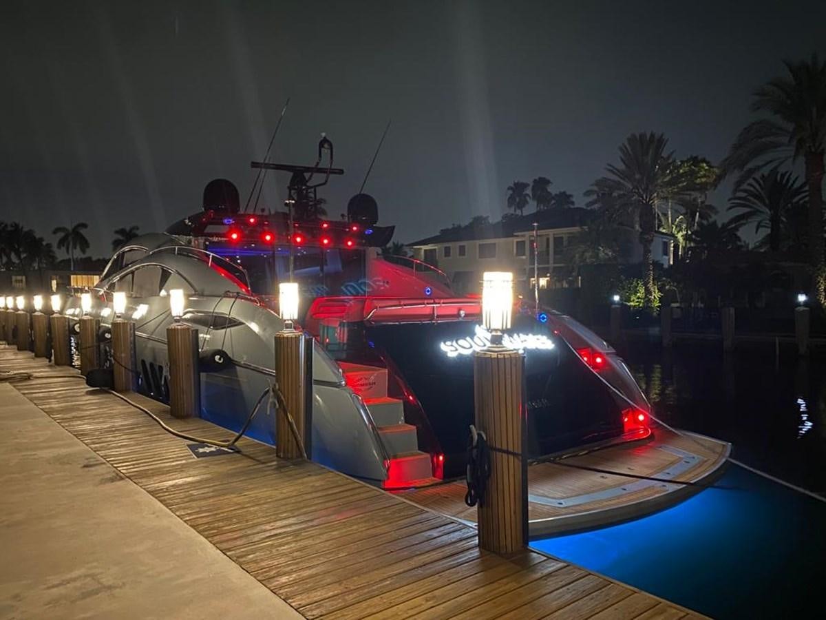 a pool with a fountain and a building in the background aboard SOUL MATES Yacht for Sale