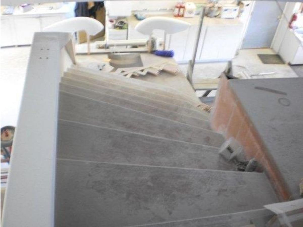 a room with a table and chairs aboard 2023 PDIGREE CAT BLOOMFIELD Yacht for Sale