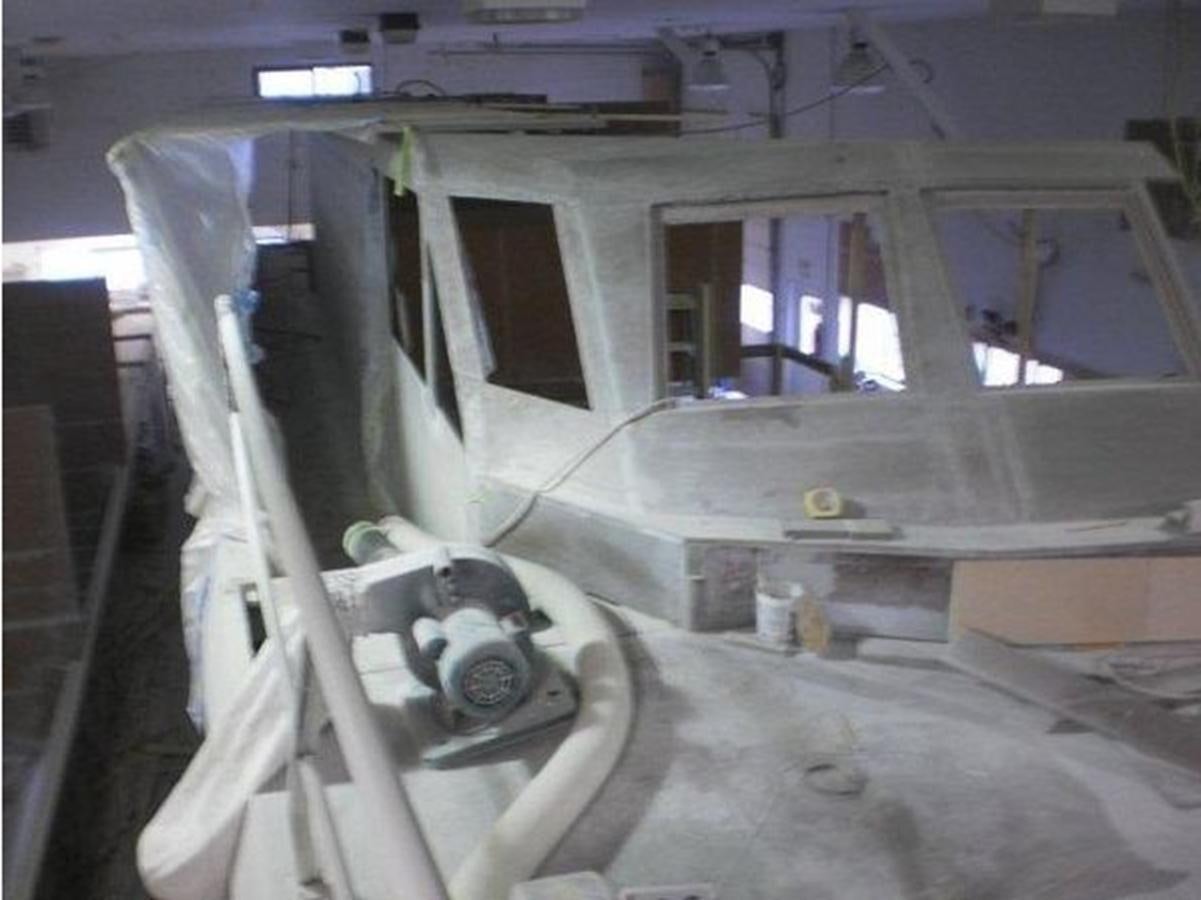 a machine in a room aboard 2023 PDIGREE CAT BLOOMFIELD Yacht for Sale