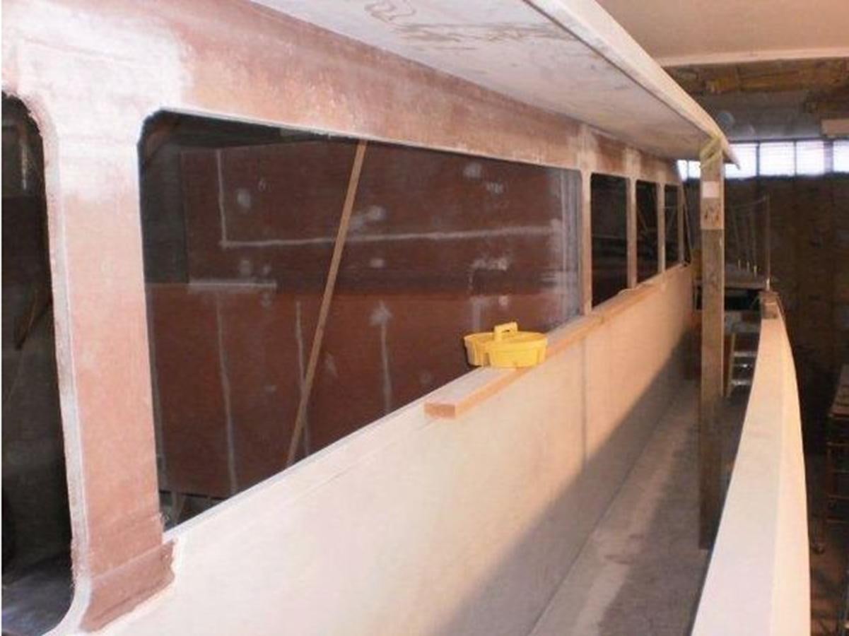 a large room with a large wooden box on the wall aboard 2023 PDIGREE CAT BLOOMFIELD Yacht for Sale