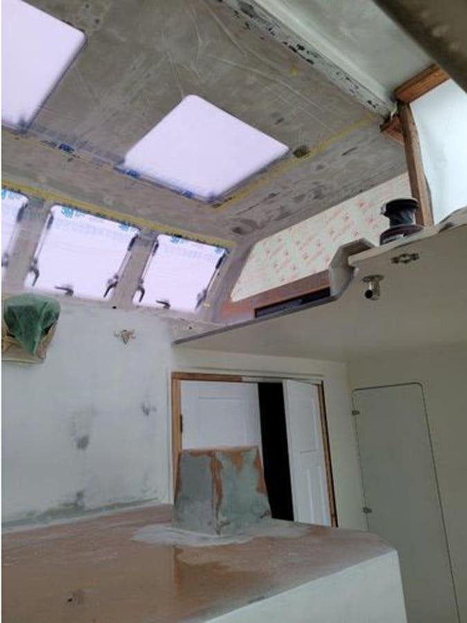 a room with a broken ceiling aboard 2023 PDIGREE CAT BLOOMFIELD Yacht for Sale