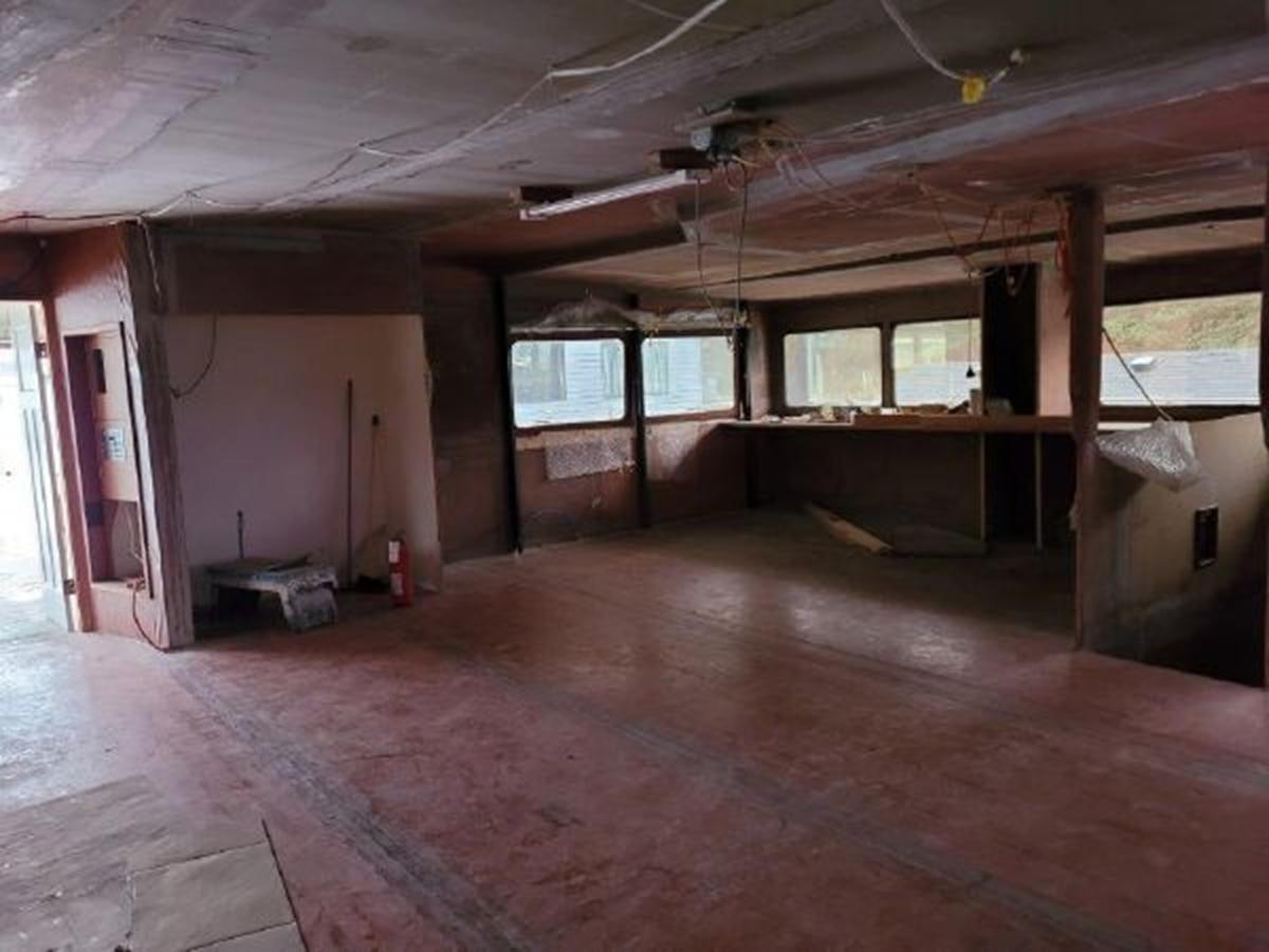 a room with a wood floor and a window aboard 2023 PDIGREE CAT BLOOMFIELD Yacht for Sale