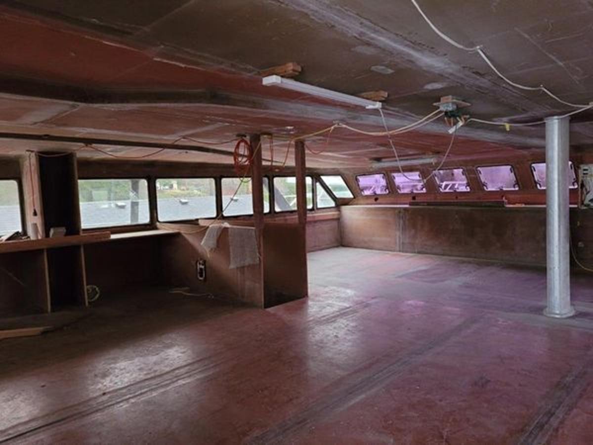 a room with a large ceiling aboard 2023 PDIGREE CAT BLOOMFIELD Yacht for Sale