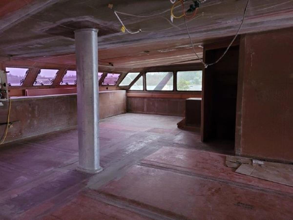 a room with a large pillar aboard 2023 PDIGREE CAT BLOOMFIELD Yacht for Sale