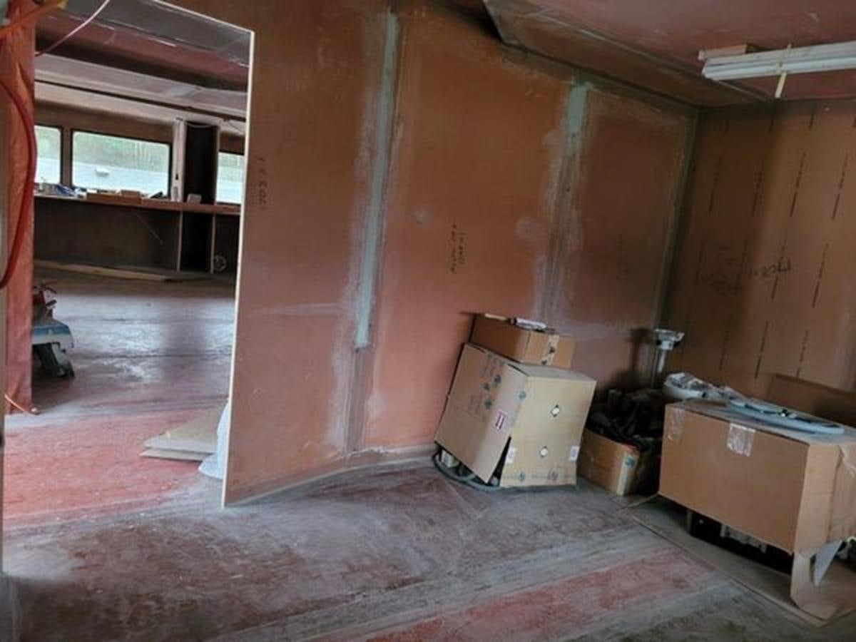 a room with a pile of wood aboard 2023 PDIGREE CAT BLOOMFIELD Yacht for Sale