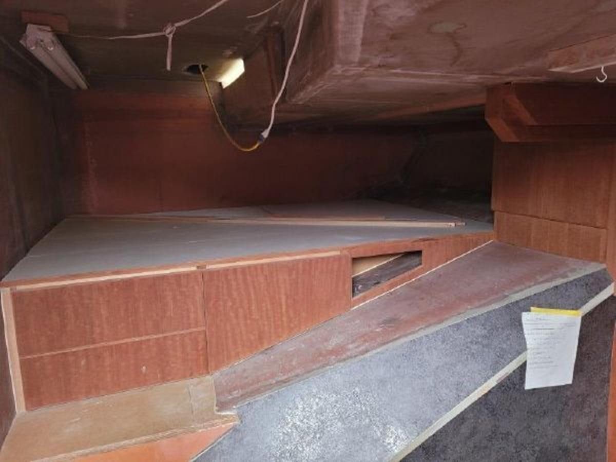 a wooden bench with a sign aboard 2023 PDIGREE CAT BLOOMFIELD Yacht for Sale