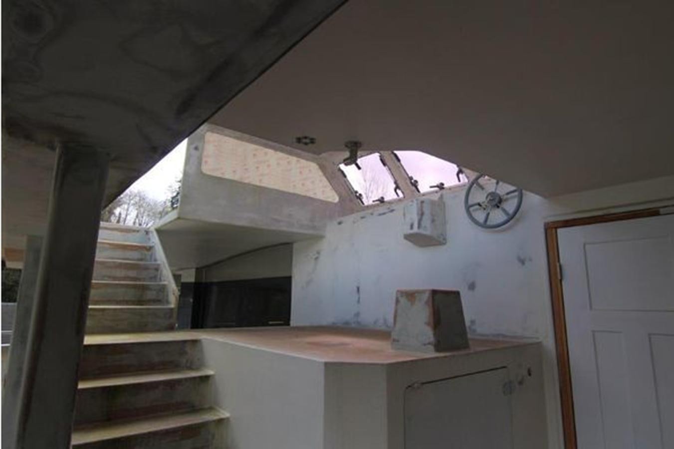 a house with stairs and a clock aboard 2023 PDIGREE CAT BLOOMFIELD Yacht for Sale