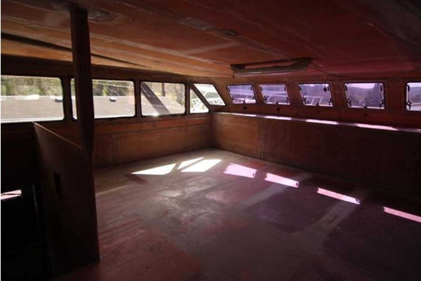 a train with a large window aboard 2023 PDIGREE CAT BLOOMFIELD Yacht for Sale