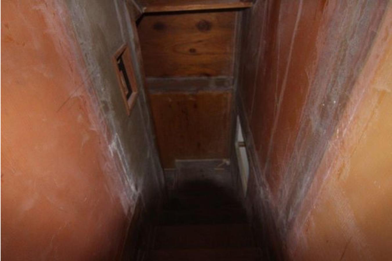 a dark hallway with a door aboard 2023 PDIGREE CAT BLOOMFIELD Yacht for Sale