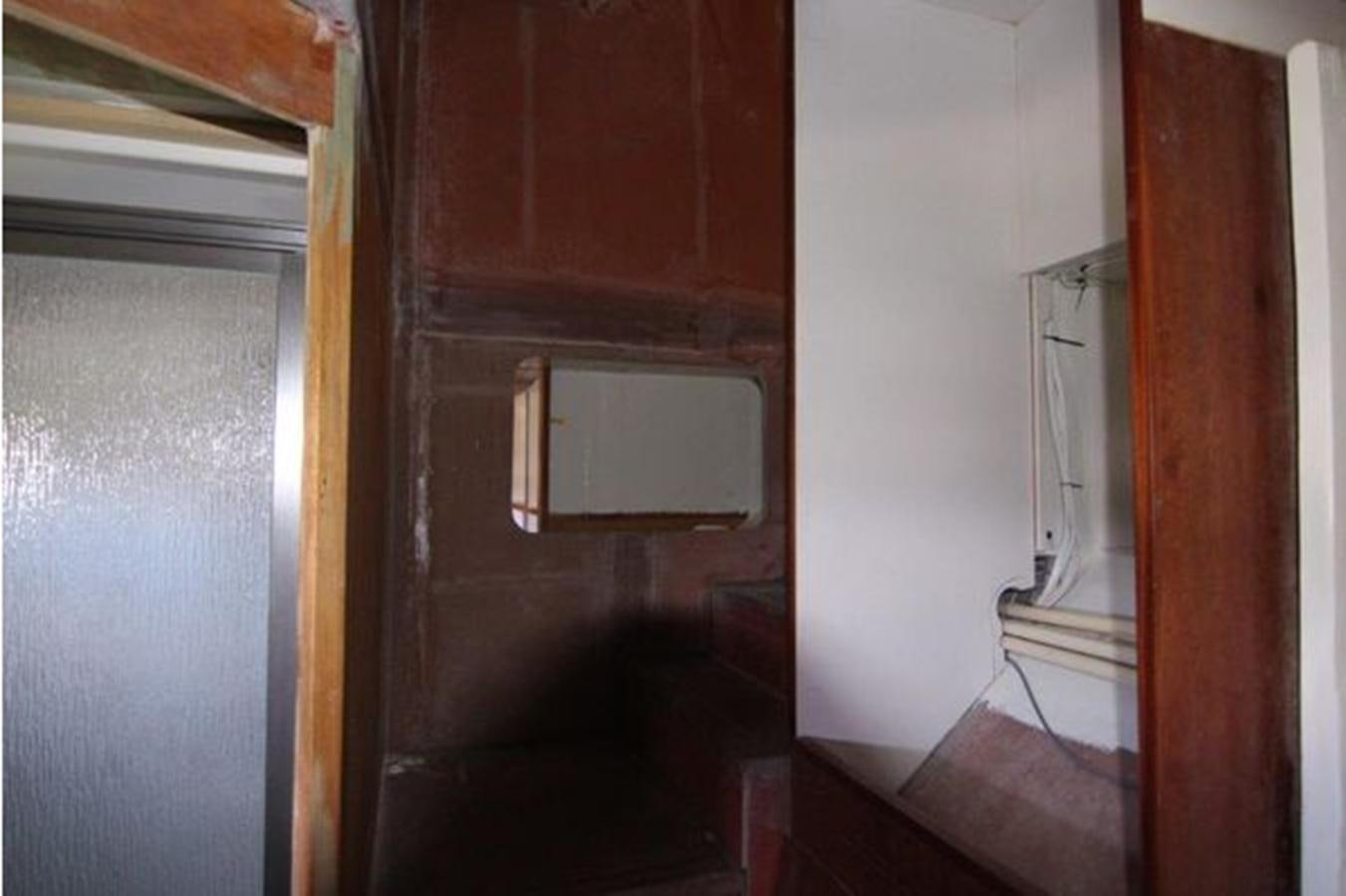 a room with a door open aboard 2023 PDIGREE CAT BLOOMFIELD Yacht for Sale