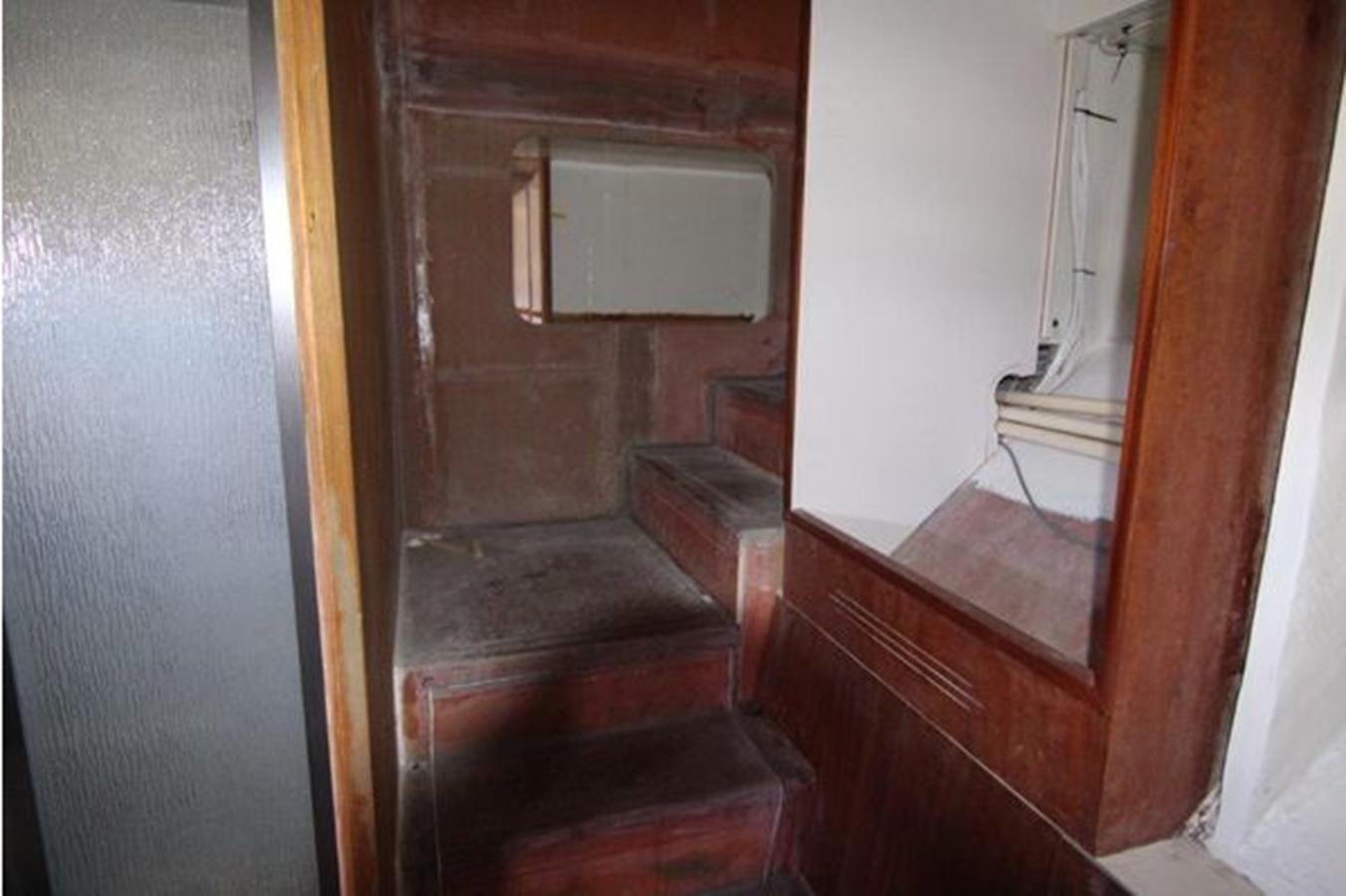 a staircase in a room aboard 2023 PDIGREE CAT BLOOMFIELD Yacht for Sale