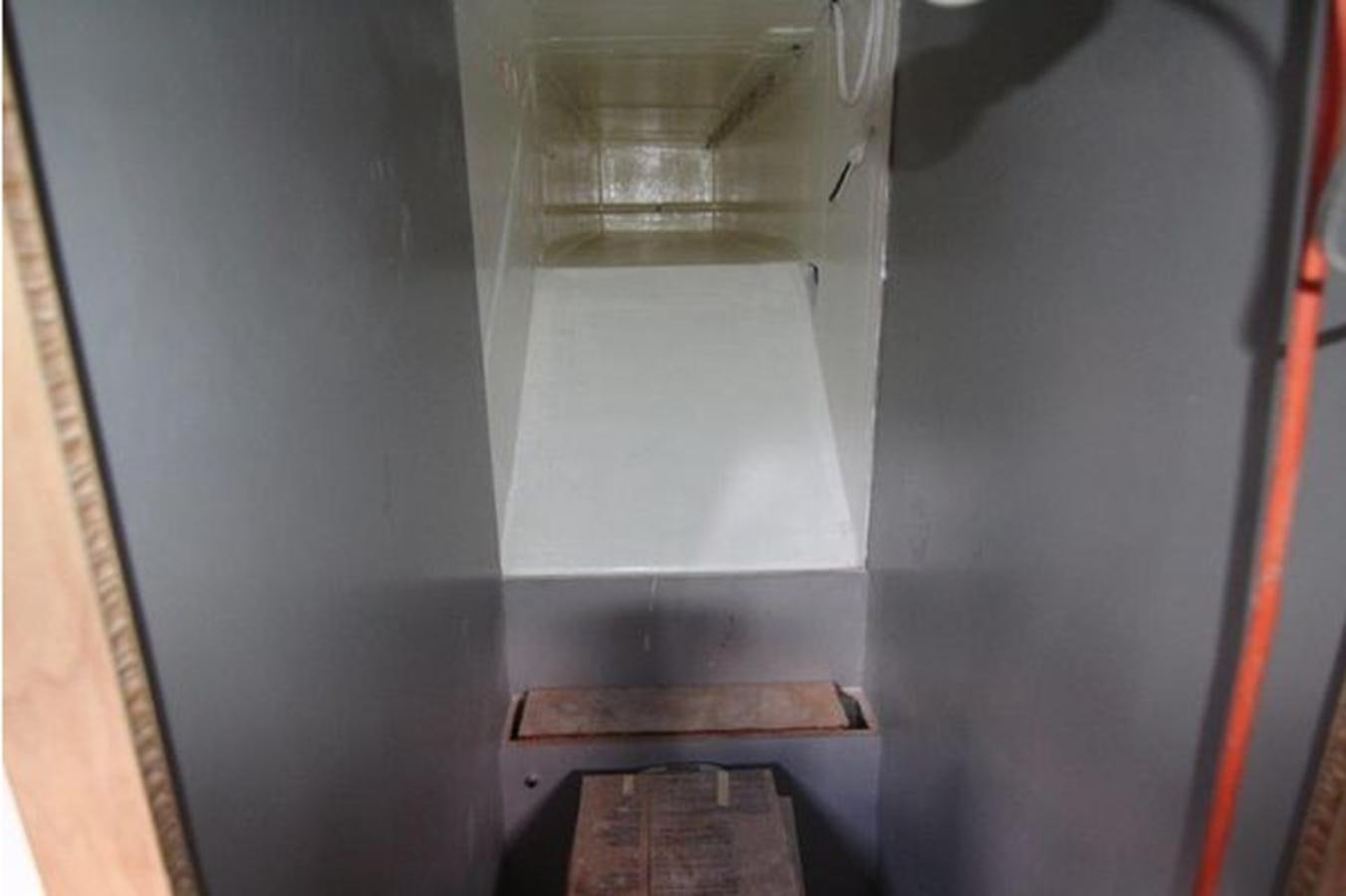 a metal box on a metal shelf aboard 2023 PDIGREE CAT BLOOMFIELD Yacht for Sale