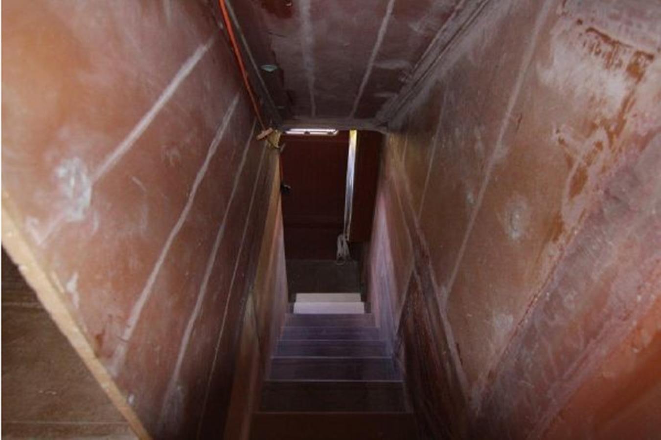 a staircase in a building aboard 2023 PDIGREE CAT BLOOMFIELD Yacht for Sale