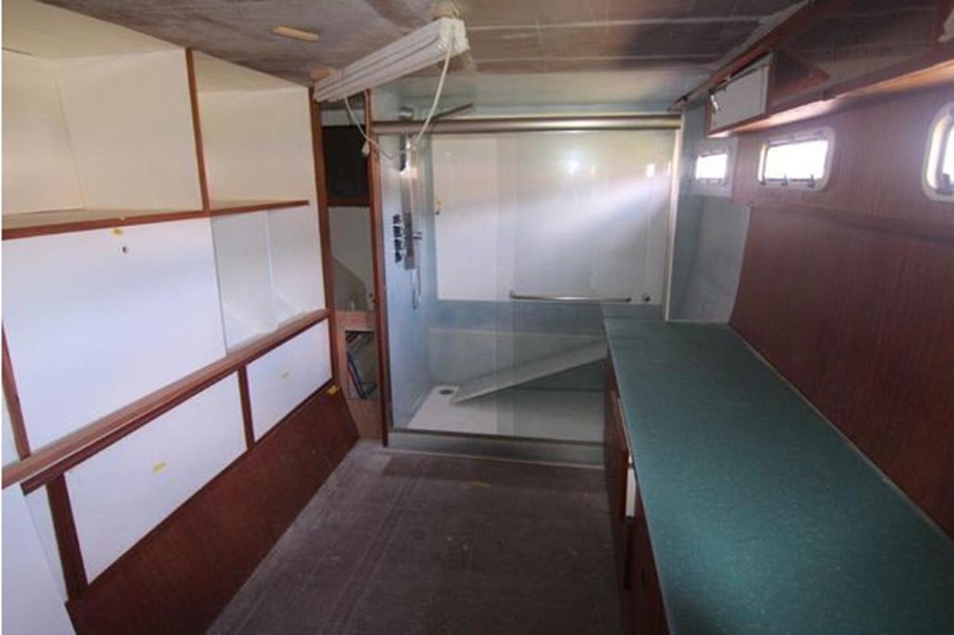 a room with a door and a window aboard 2023 PDIGREE CAT BLOOMFIELD Yacht for Sale