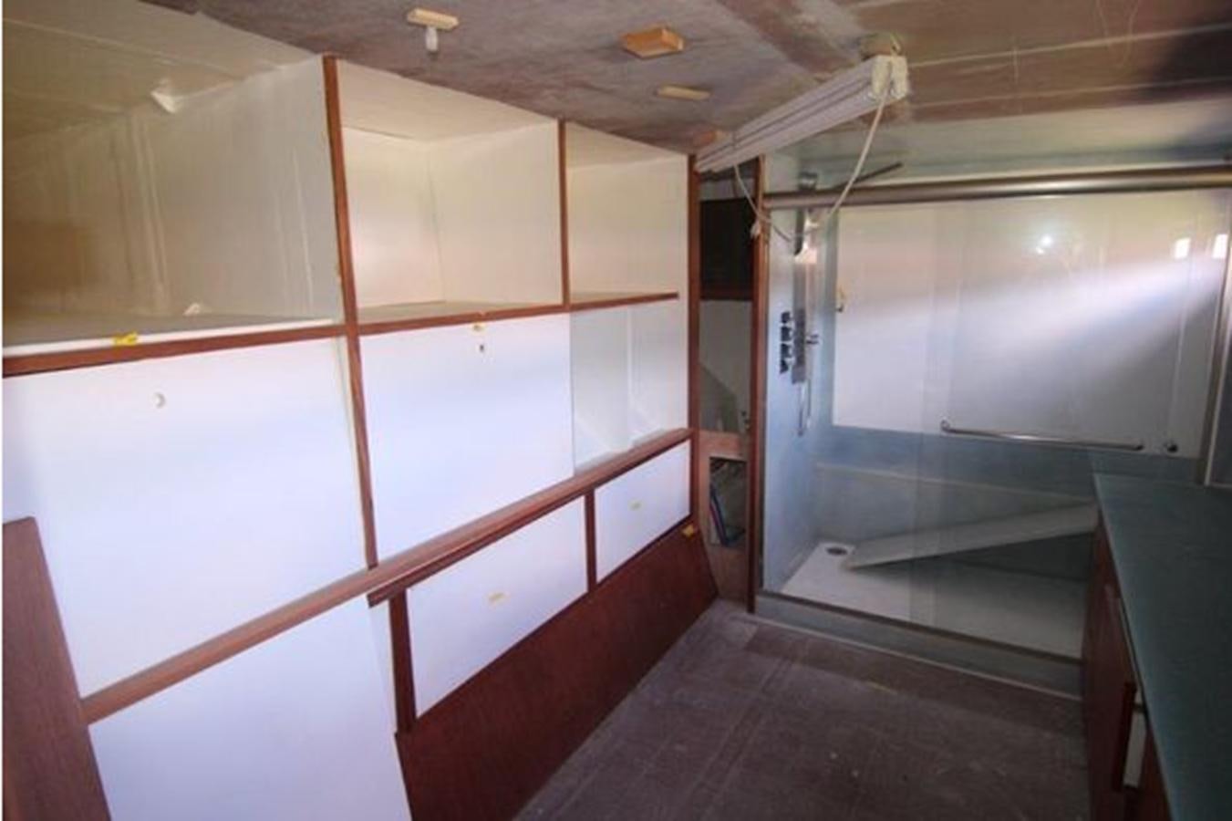 a room with a door and a window aboard 2023 PDIGREE CAT BLOOMFIELD Yacht for Sale