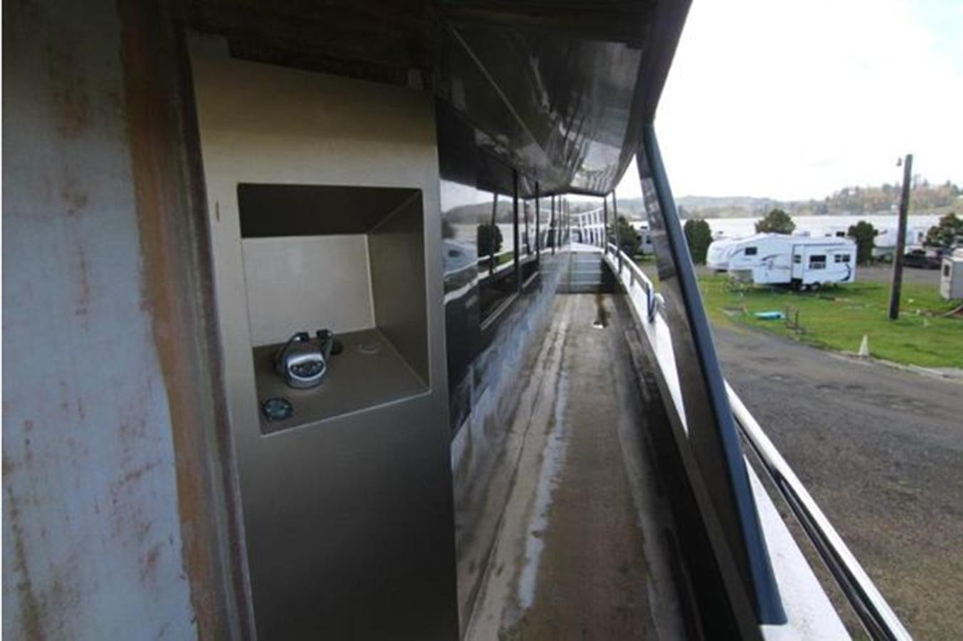 a car parked on a road aboard 2023 PDIGREE CAT BLOOMFIELD Yacht for Sale