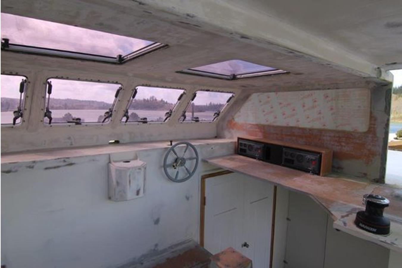 a clock on a wall aboard 2023 PDIGREE CAT BLOOMFIELD Yacht for Sale