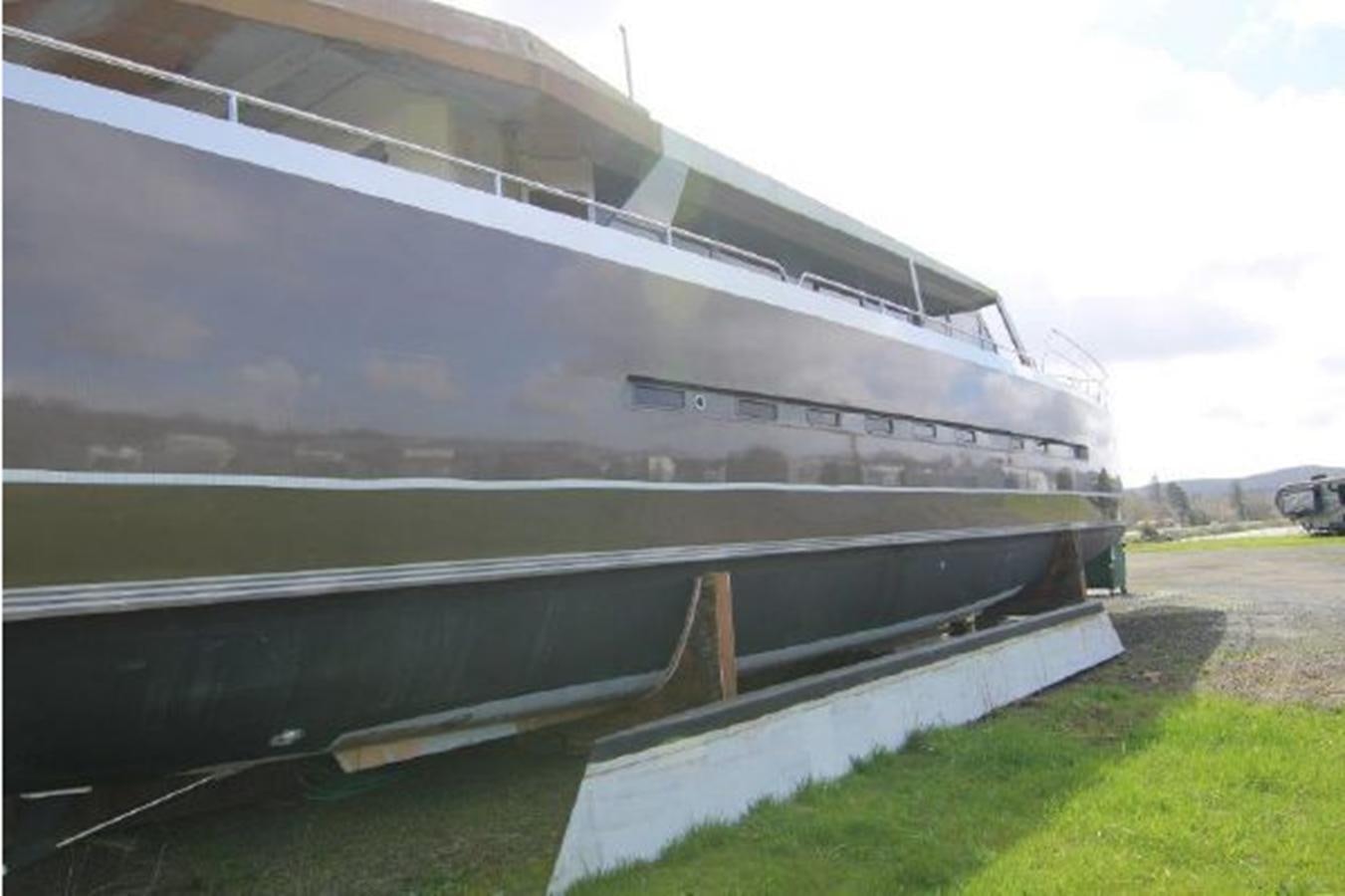 a large silver airplane aboard 2023 PDIGREE CAT BLOOMFIELD Yacht for Sale
