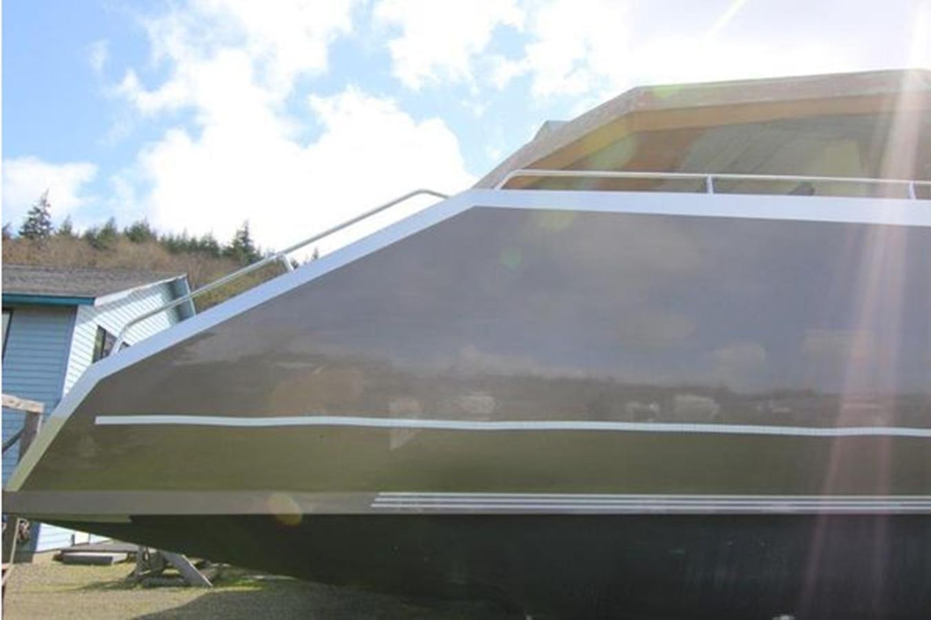 a building with a roof aboard 2023 PDIGREE CAT BLOOMFIELD Yacht for Sale