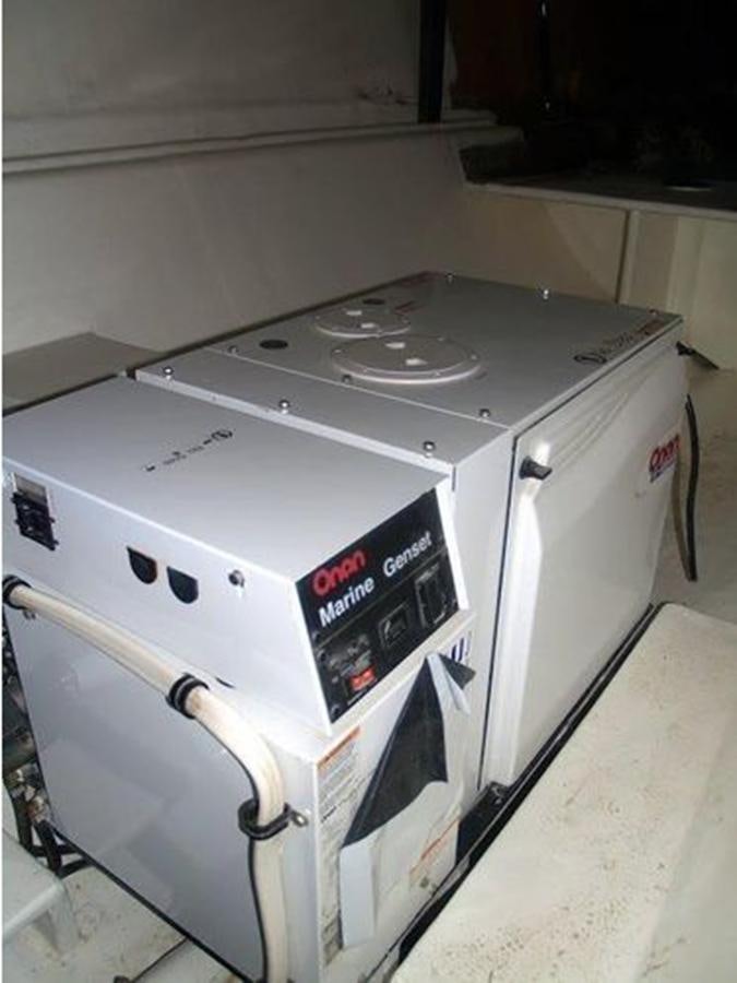 a white washing machine aboard 2023 PDIGREE CAT BLOOMFIELD Yacht for Sale