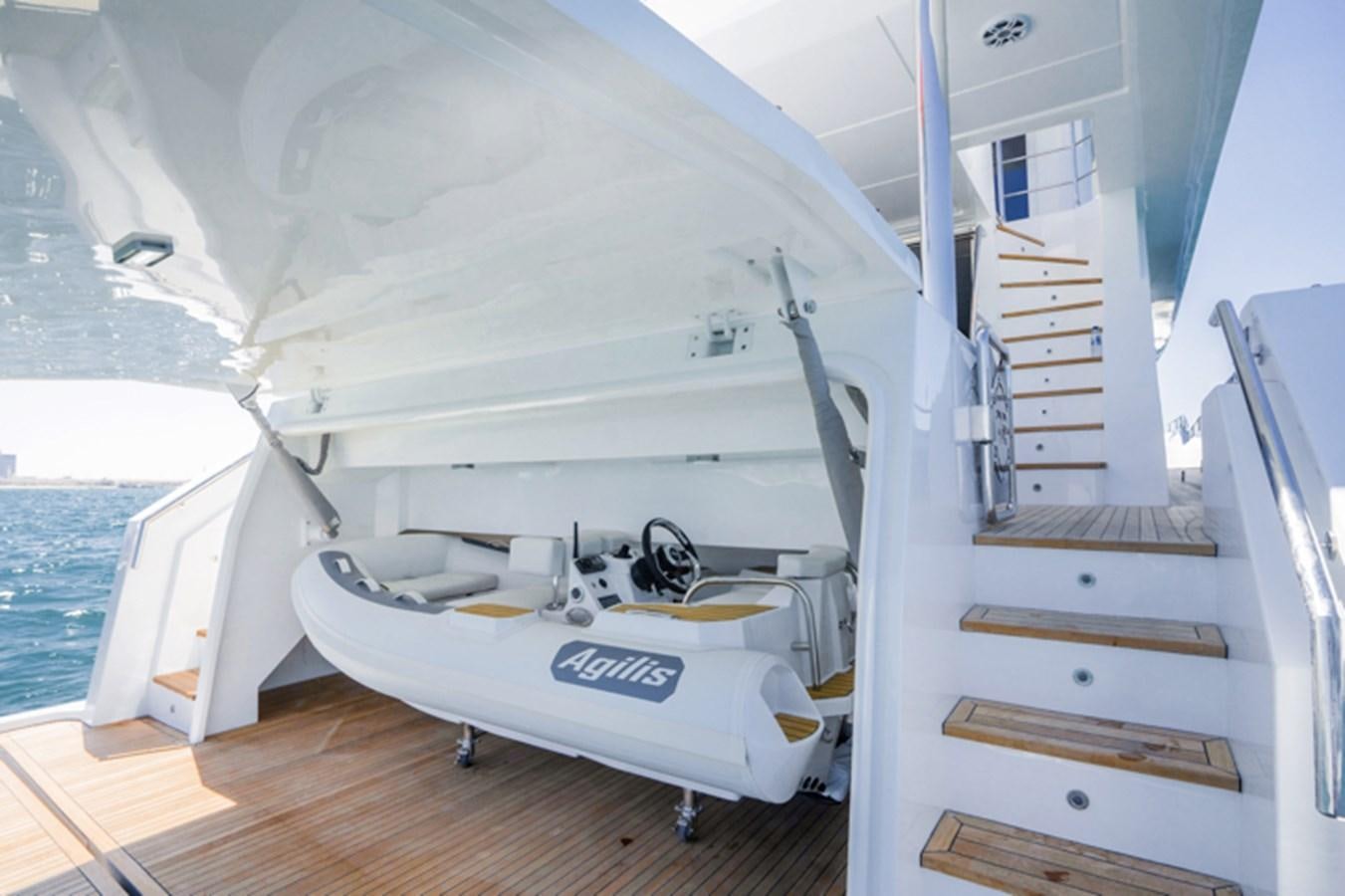 a boat on a deck aboard SG Yacht for Sale